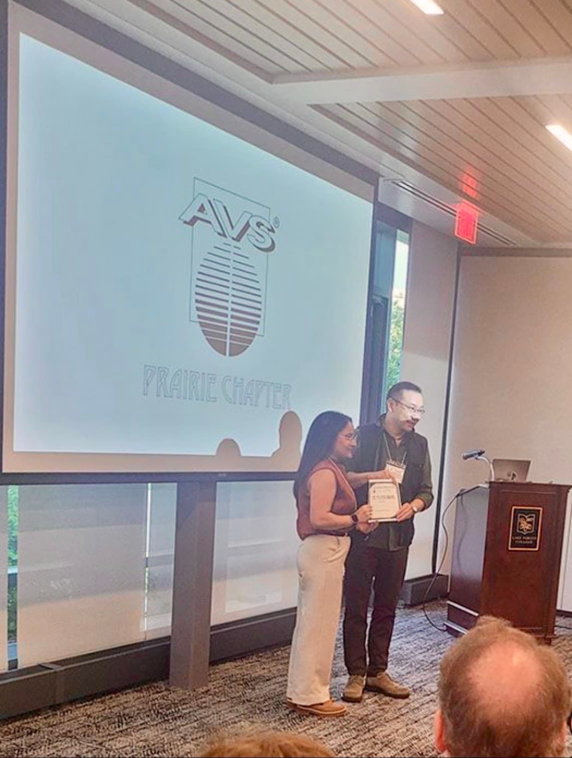 Receiving the Best Poster Award at the AVS 2025 Prairie Chapter Symposium